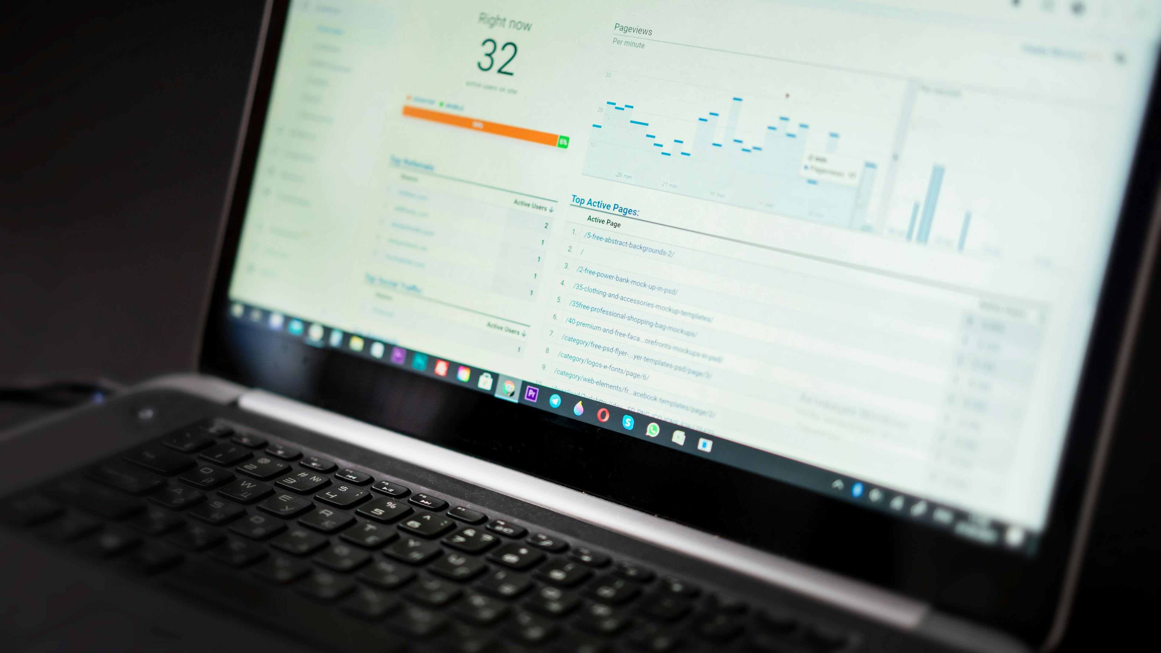 Upward-trending revenue dashboard on a laptop in a modern office, illustrating service-business revenue growth