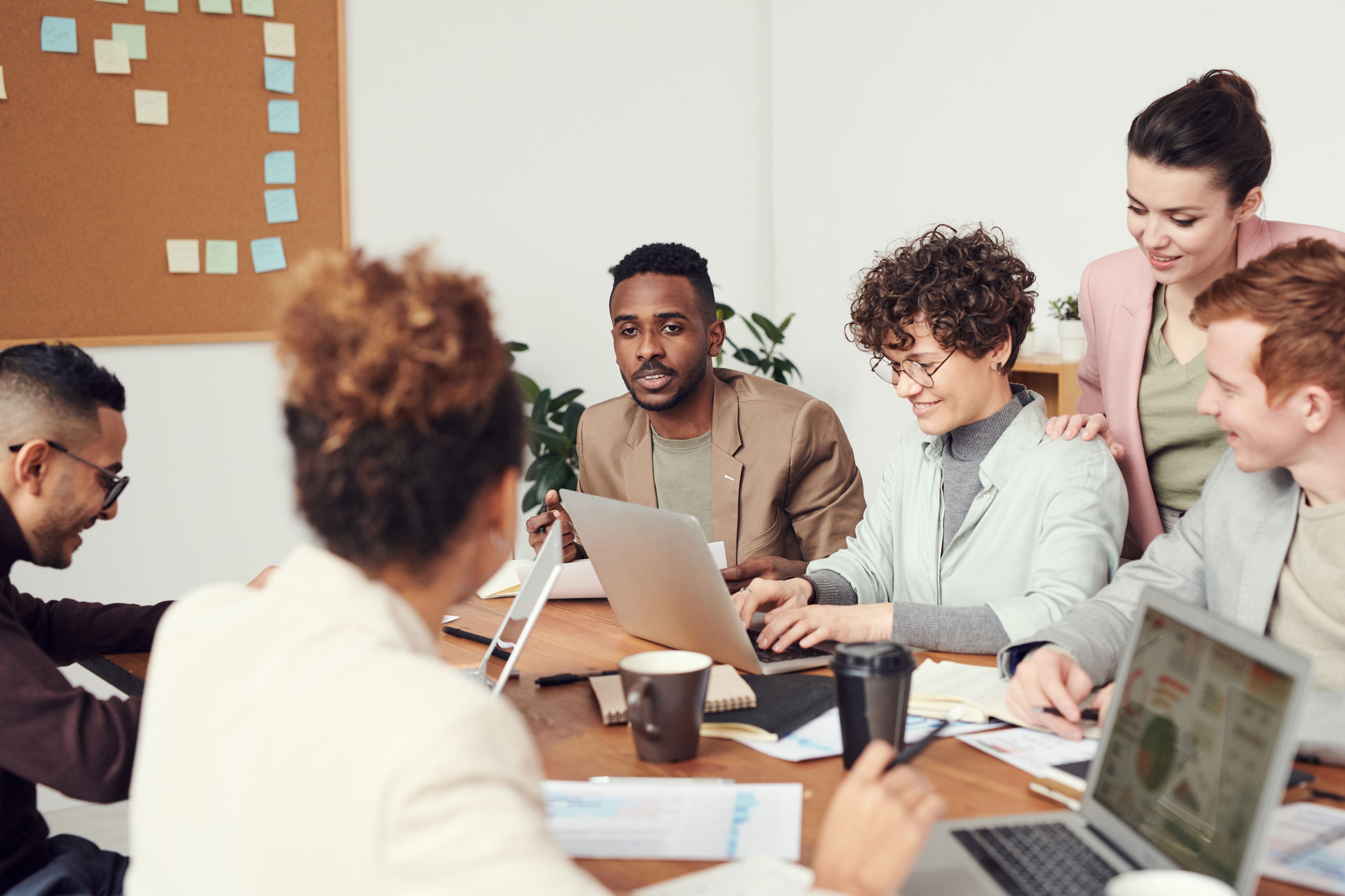 Marketer planning campaign channels on a whiteboard